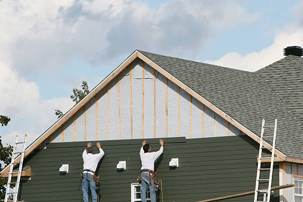 Professional Siding Installation technician working in Berthoud, CO